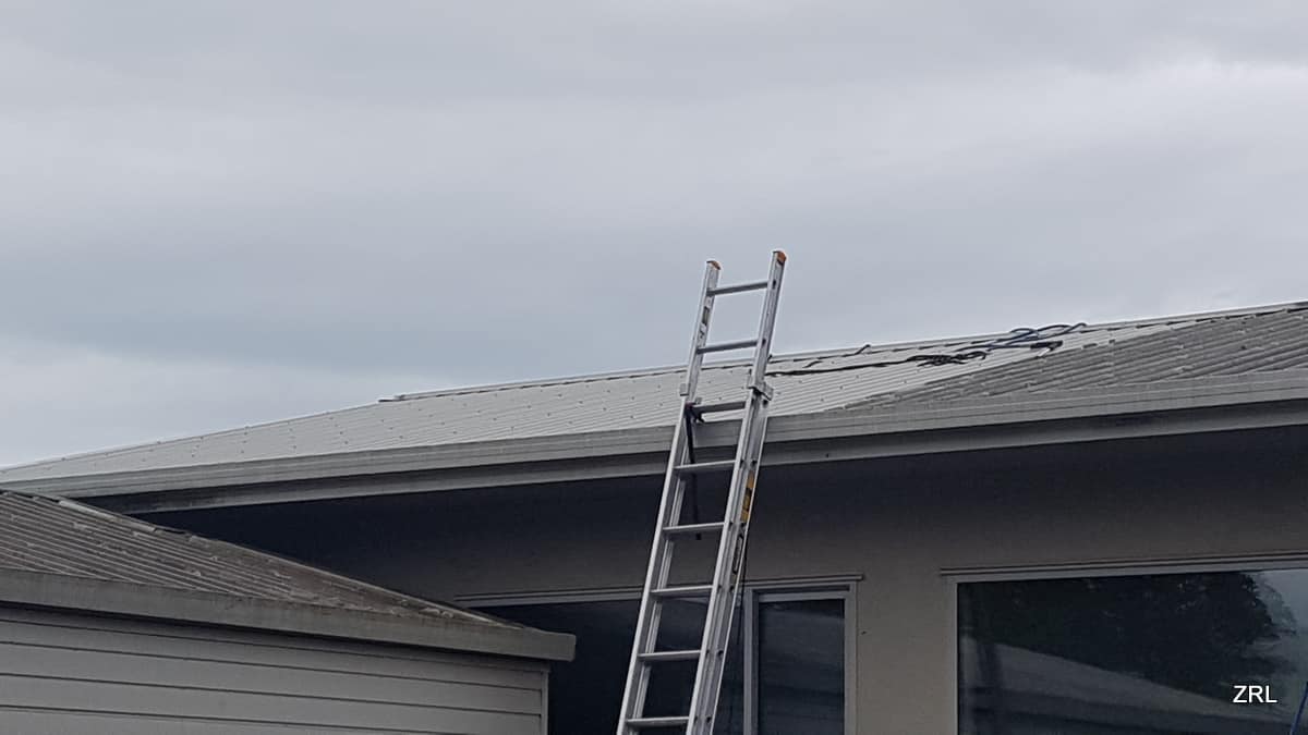 cleaning a longrun roof